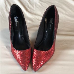 Lightly worn Red spiky heels